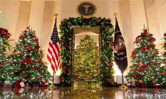 تصاویری از تزئینات کاخ سفید در امریکا با گل های زیبا برای کریسمس